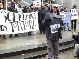 Dakem Roberts, a survivor of solitary confinement on Rikers Island, speaks at a press conference sponsored by the Jails Action Coalition. Photo provided by JAC.