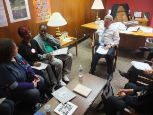 Tama Bell and other advocates make their case for the HALT Act to Assembly Member David Weprin.