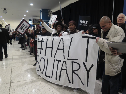 Advocates form a gauntlet for legislators to pass on their way to Cuomo's budget address. Photo: Katie Rose Quandt